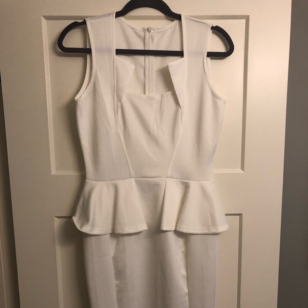 Fitted midi peplum dress
